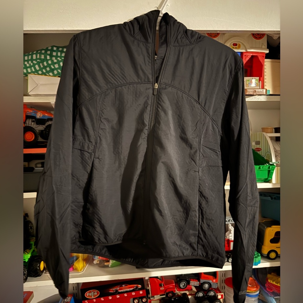 Lululemon jacket. See photo. Never worn! Just bought the wrong size